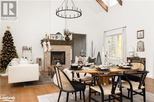 303 Clearwater Lake Road, Huntsville, ON - Indoor Photo Showing Dining Room With Fireplace