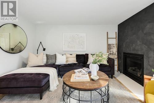 104 Dutch Myrtle Way, Toronto, ON - Indoor Photo Showing Living Room With Fireplace