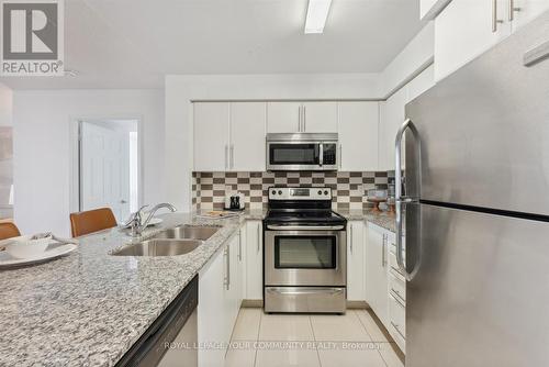 310 - 75 King William Crescent, Richmond Hill, ON - Indoor Photo Showing Kitchen With Stainless Steel Kitchen With Double Sink With Upgraded Kitchen