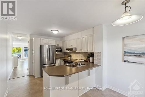 648A Chapman Mills Drive, Ottawa, ON - Indoor Photo Showing Kitchen With Stainless Steel Kitchen With Double Sink