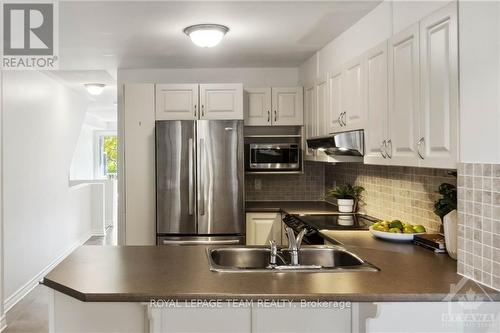 648A Chapman Mills Drive, Ottawa, ON - Indoor Photo Showing Kitchen With Double Sink