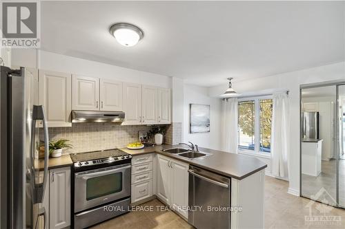 648A Chapman Mills Drive, Ottawa, ON - Indoor Photo Showing Kitchen With Stainless Steel Kitchen With Double Sink