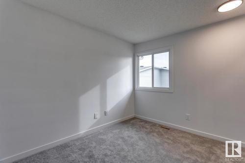 #50 15710 Beaumaris Rd Nw, Edmonton, AB - Indoor Photo Showing Other Room