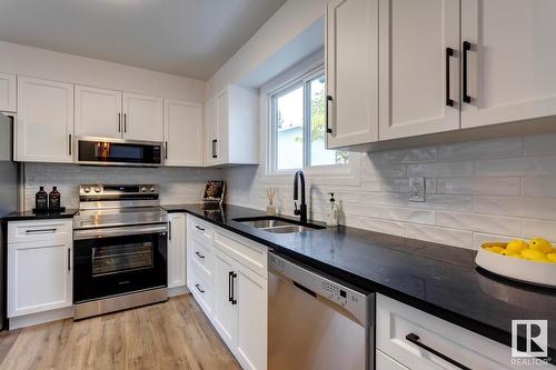 #50 15710 Beaumaris Rd Nw, Edmonton, AB - Indoor Photo Showing Kitchen With Double Sink