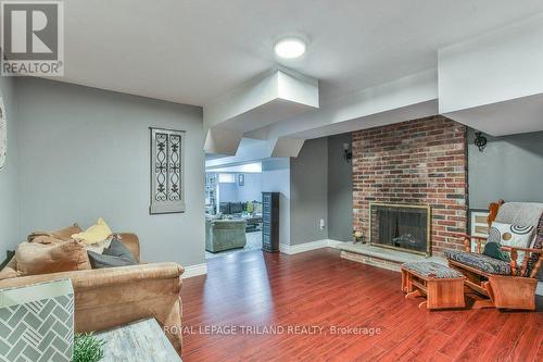 115 Loggers Grove, London, ON - Indoor Photo Showing Living Room With Fireplace