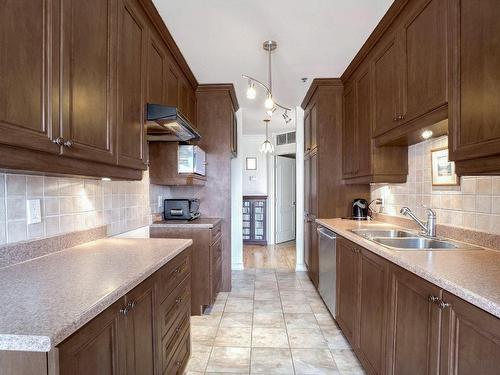 Kitchen - 708-3050 Boul. Notre-Dame, Laval (Chomedey), QC - Indoor Photo Showing Kitchen With Double Sink