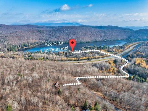 50 Ch. Des Muses, Mont-Tremblant, QC - Outdoor With Body Of Water With View