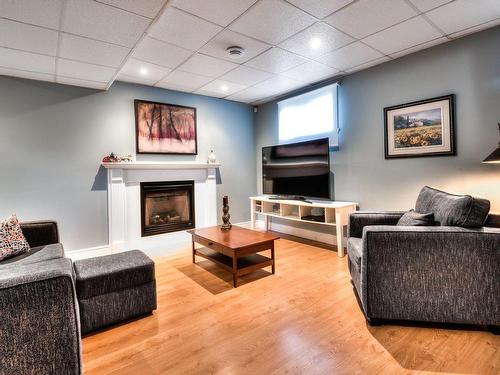 Family room - 55 Rue Dubois, Varennes, QC - Indoor With Fireplace