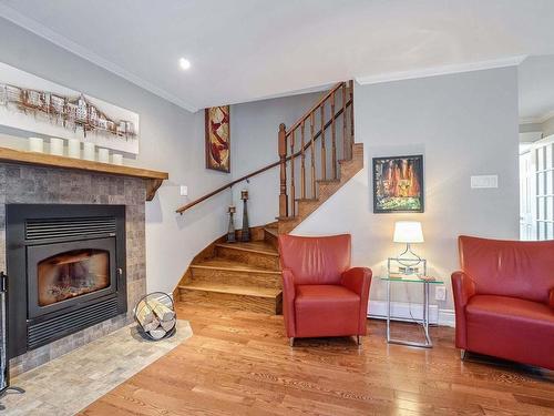 Salon - 1031 Rue Gérard-Cloutier, Prévost, QC - Indoor Photo Showing Living Room With Fireplace