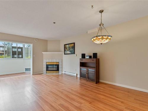 307-2900 Orillia St, Saanich, BC - Indoor Photo Showing Living Room With Fireplace