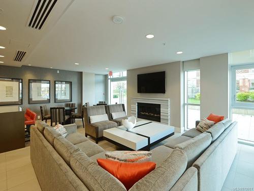 1404-83 Saghalie Rd, Victoria, BC - Indoor Photo Showing Living Room With Fireplace