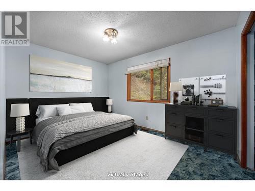 8247 Westsyde Road, Kamloops, BC - Indoor Photo Showing Bedroom