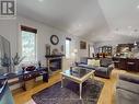 122 Trout Lane, Tiny, ON  - Indoor Photo Showing Living Room With Fireplace 