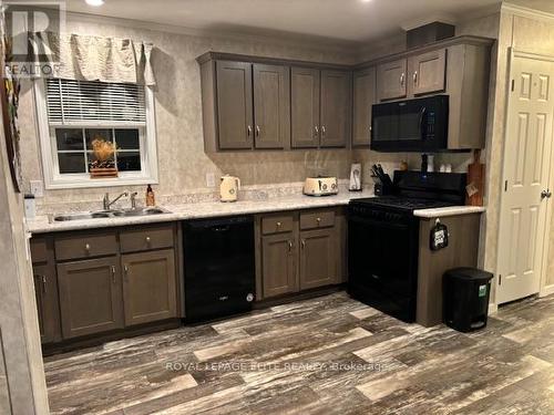 66 - 26585 Highway 89, Southgate, ON - Indoor Photo Showing Kitchen With Double Sink