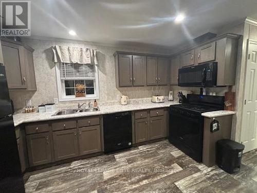 66 - 26585 Highway 89, Southgate, ON - Indoor Photo Showing Kitchen With Double Sink