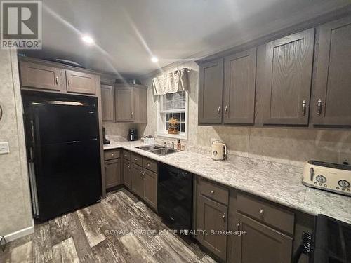 66 - 26585 Highway 89, Southgate, ON - Indoor Photo Showing Kitchen With Double Sink