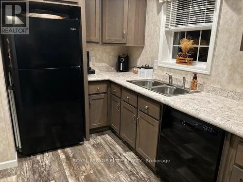 66 - 26585 Highway 89, Southgate, ON - Indoor Photo Showing Kitchen With Double Sink