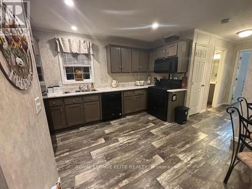 66 - 26585 Highway 89, Southgate, ON - Indoor Photo Showing Kitchen With Double Sink