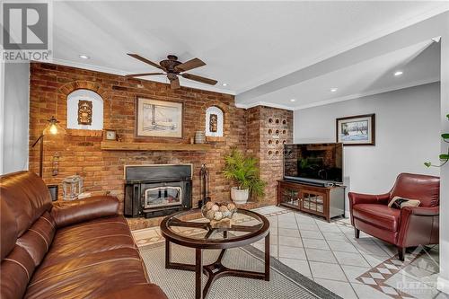 22 Stroughton Crescent, Munster, ON - Indoor Photo Showing Living Room With Fireplace