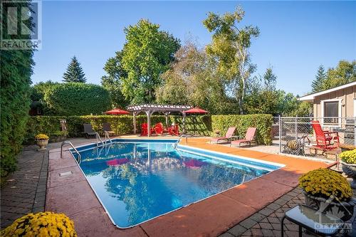 22 Stroughton Crescent, Munster, ON - Outdoor With In Ground Pool With Backyard