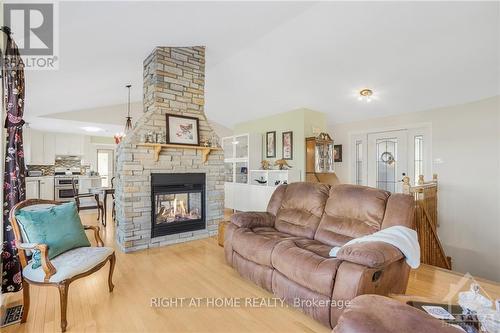 3695 Front Road, East Hawkesbury, ON - Indoor Photo Showing Living Room With Fireplace