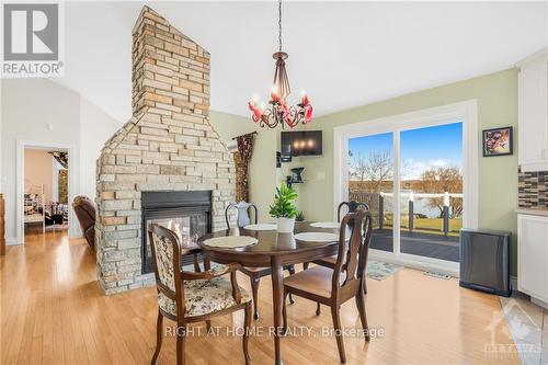 3695 Front Road, East Hawkesbury, ON - Indoor Photo Showing Dining Room With Fireplace