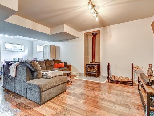 Family room - 214 Rue Jean-Pierre, Sainte-Sophie, QC - Indoor Photo Showing Living Room