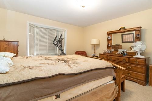 102-1321 Ridgeway Drive, Kelowna, BC - Indoor Photo Showing Bedroom