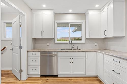 680 Princess Road, Kelowna, BC - Indoor Photo Showing Kitchen With Double Sink