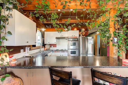 5974 Farmers Drive, Kelowna, BC - Indoor Photo Showing Kitchen With Double Sink