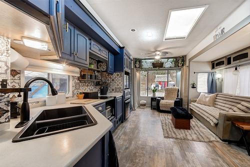 5974 Farmers Drive, Kelowna, BC - Indoor Photo Showing Kitchen With Double Sink