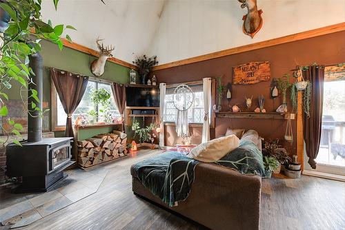 5974 Farmers Drive, Kelowna, BC - Indoor Photo Showing Living Room With Fireplace