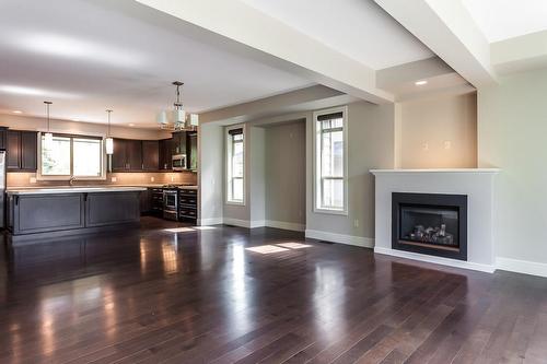 4-1865 Begbie Road, Kelowna, BC - Indoor Photo Showing Living Room With Fireplace