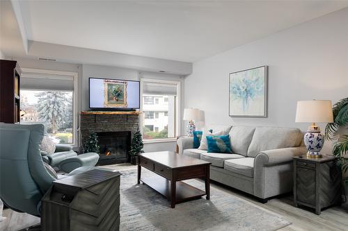 206-3335 Richter Street, Kelowna, BC - Indoor Photo Showing Living Room With Fireplace