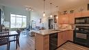 407-130 Barber Road, Kelowna, BC  - Indoor Photo Showing Kitchen With Double Sink 