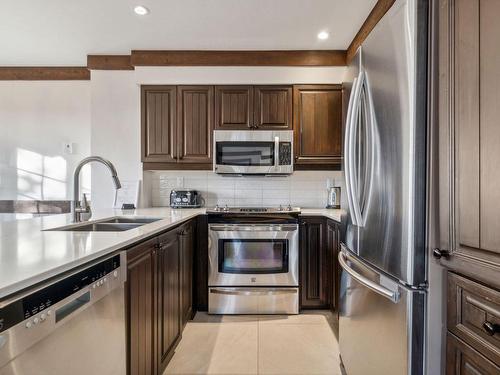 Kitchen - 1-122 Ch. Des Sous-Bois, Mont-Tremblant, QC - Indoor Photo Showing Kitchen With Double Sink With Upgraded Kitchen