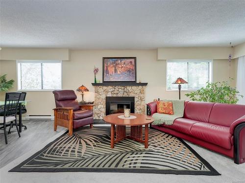 24-3958 Cedar Hill Rd, Saanich, BC - Indoor Photo Showing Living Room With Fireplace