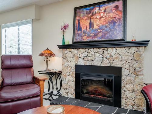 24-3958 Cedar Hill Rd, Saanich, BC - Indoor Photo Showing Living Room With Fireplace