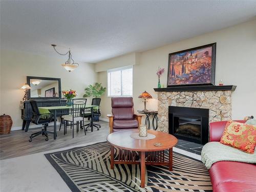 24-3958 Cedar Hill Rd, Saanich, BC - Indoor Photo Showing Living Room With Fireplace