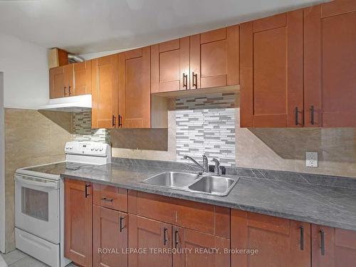 2977 Lawrence Ave E, Toronto, ON - Indoor Photo Showing Kitchen With Double Sink