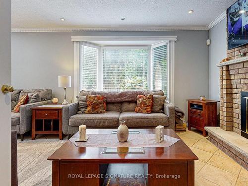 135 William Stephenson Dr, Whitby, ON - Indoor Photo Showing Living Room With Fireplace