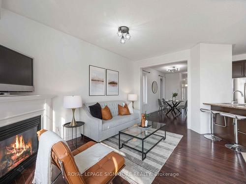 11 Gooseman Cres, Markham, ON - Indoor Photo Showing Living Room With Fireplace