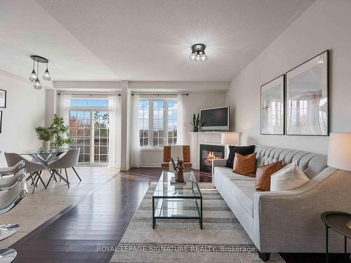 11 Gooseman Cres, Markham, ON - Indoor Photo Showing Living Room With Fireplace