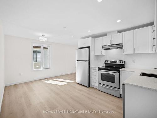 Main-96 Hickling Tr, Barrie, ON - Indoor Photo Showing Kitchen With Stainless Steel Kitchen With Double Sink