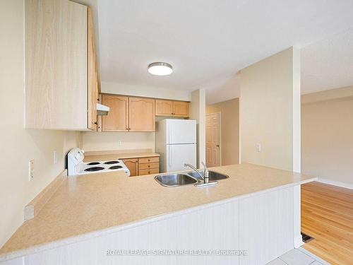 4909 James Austin Dr, Mississauga, ON - Indoor Photo Showing Kitchen With Double Sink