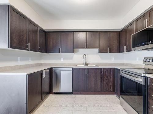 27-2468 Post Rd, Oakville, ON - Indoor Photo Showing Kitchen With Stainless Steel Kitchen With Double Sink