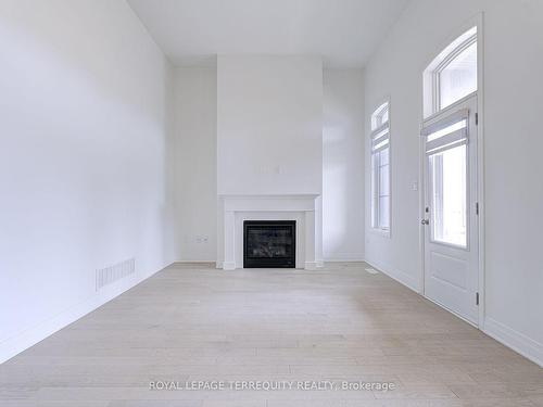 945 Chestnut Hts, Milton, ON - Indoor Photo Showing Other Room With Fireplace