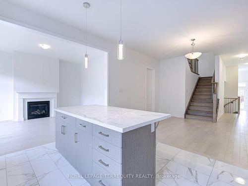 945 Chestnut Hts, Milton, ON - Indoor Photo Showing Other Room With Fireplace