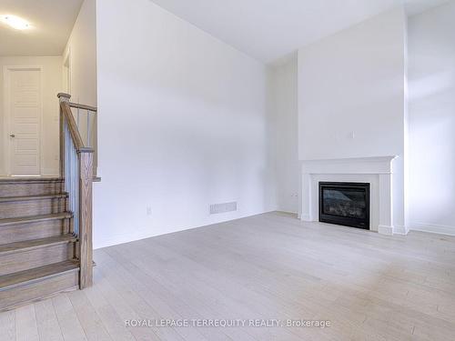 945 Chestnut Hts, Milton, ON - Indoor Photo Showing Other Room With Fireplace