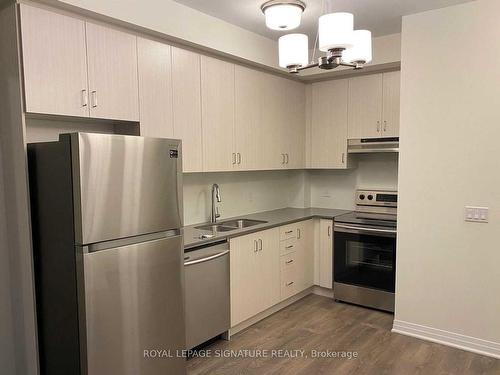 436-1105 Leger Way, Milton, ON - Indoor Photo Showing Kitchen With Double Sink